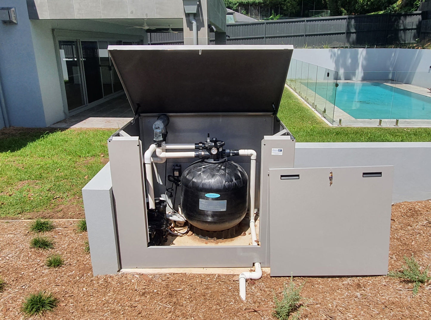 Acoustic Box outdoor soundproof enclosure installed over pool pump system near pool